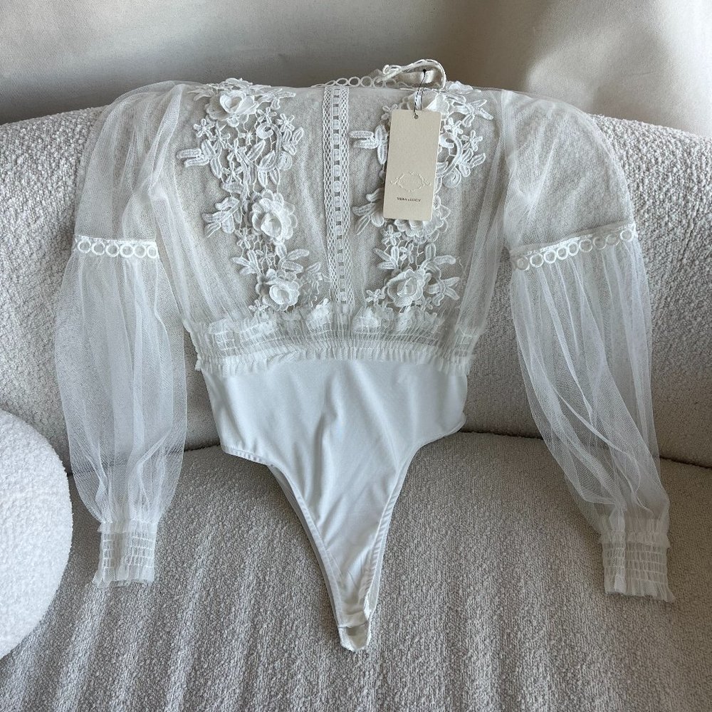 Vera & Lucy lace bodysuit, new with tags, never worn! Medium